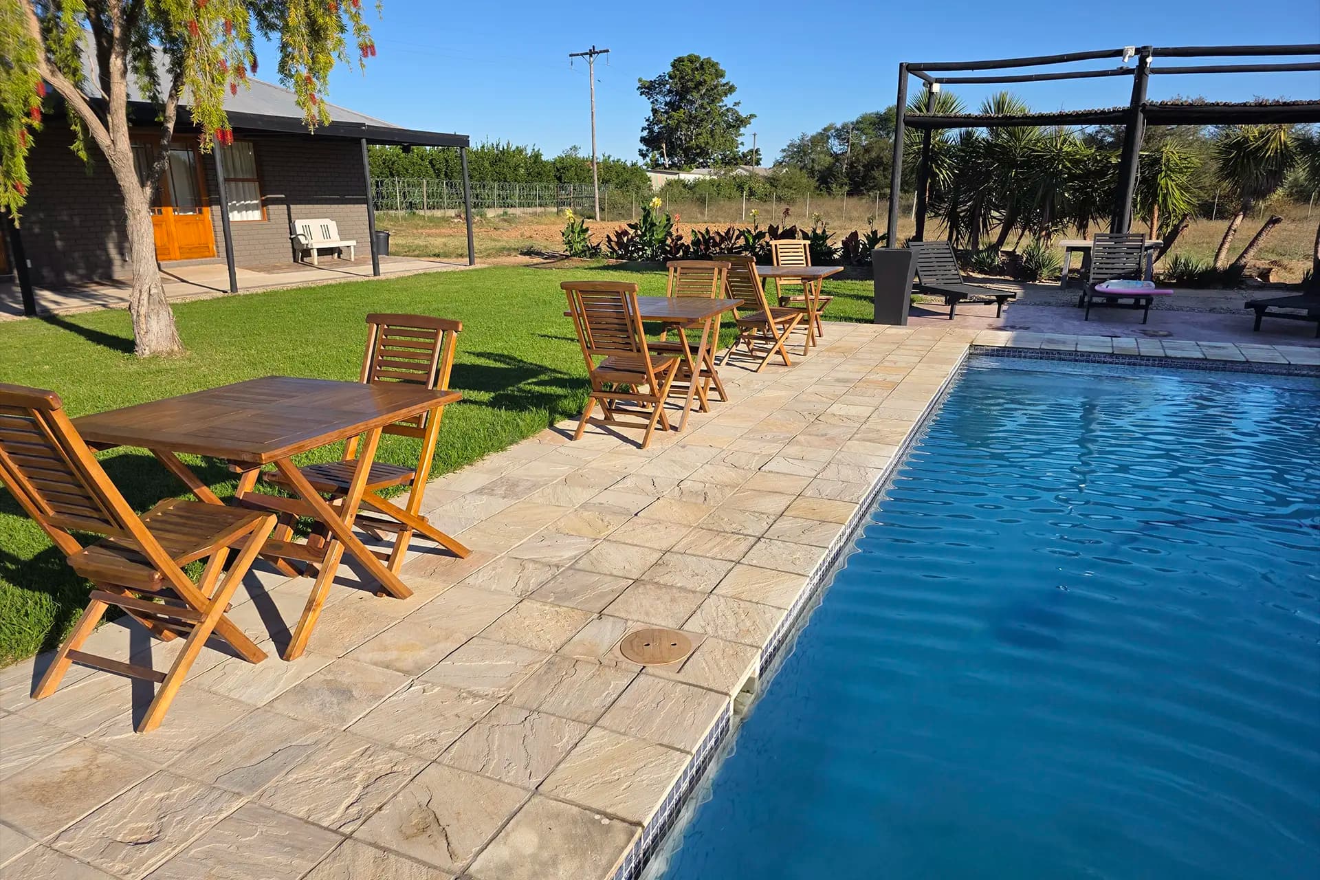 Garden and pool at sunset