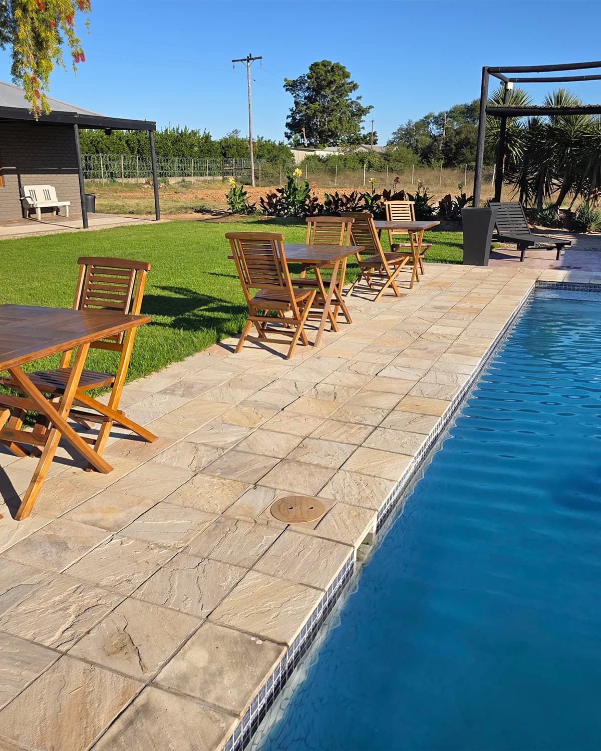 Poolside tables in the garden